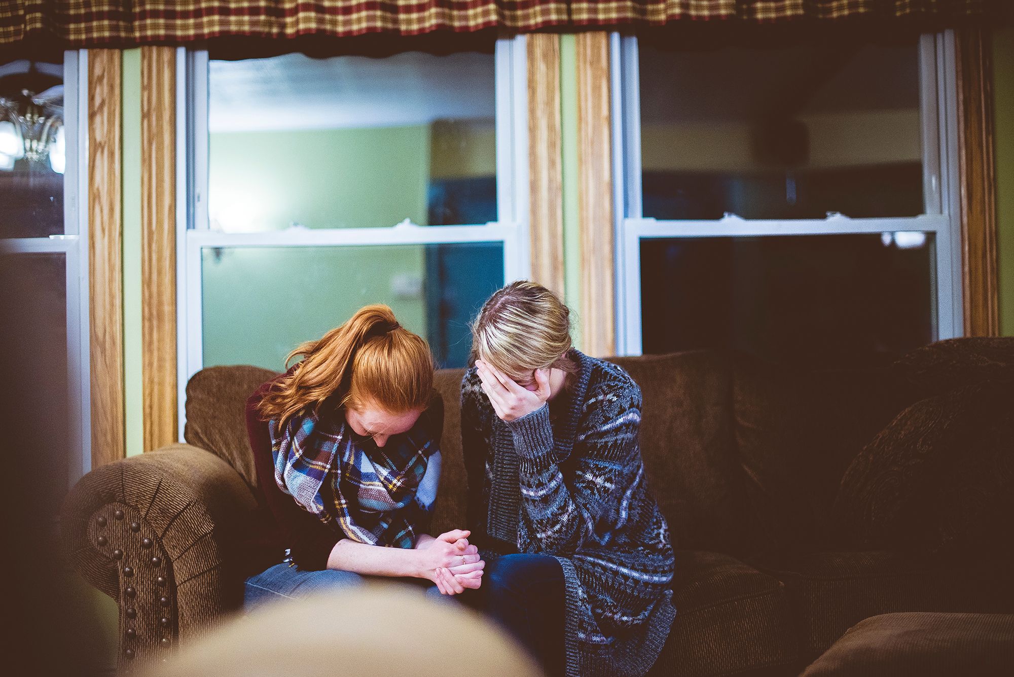 two women grieving