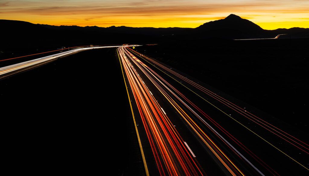 sunset with traffic lights on highway