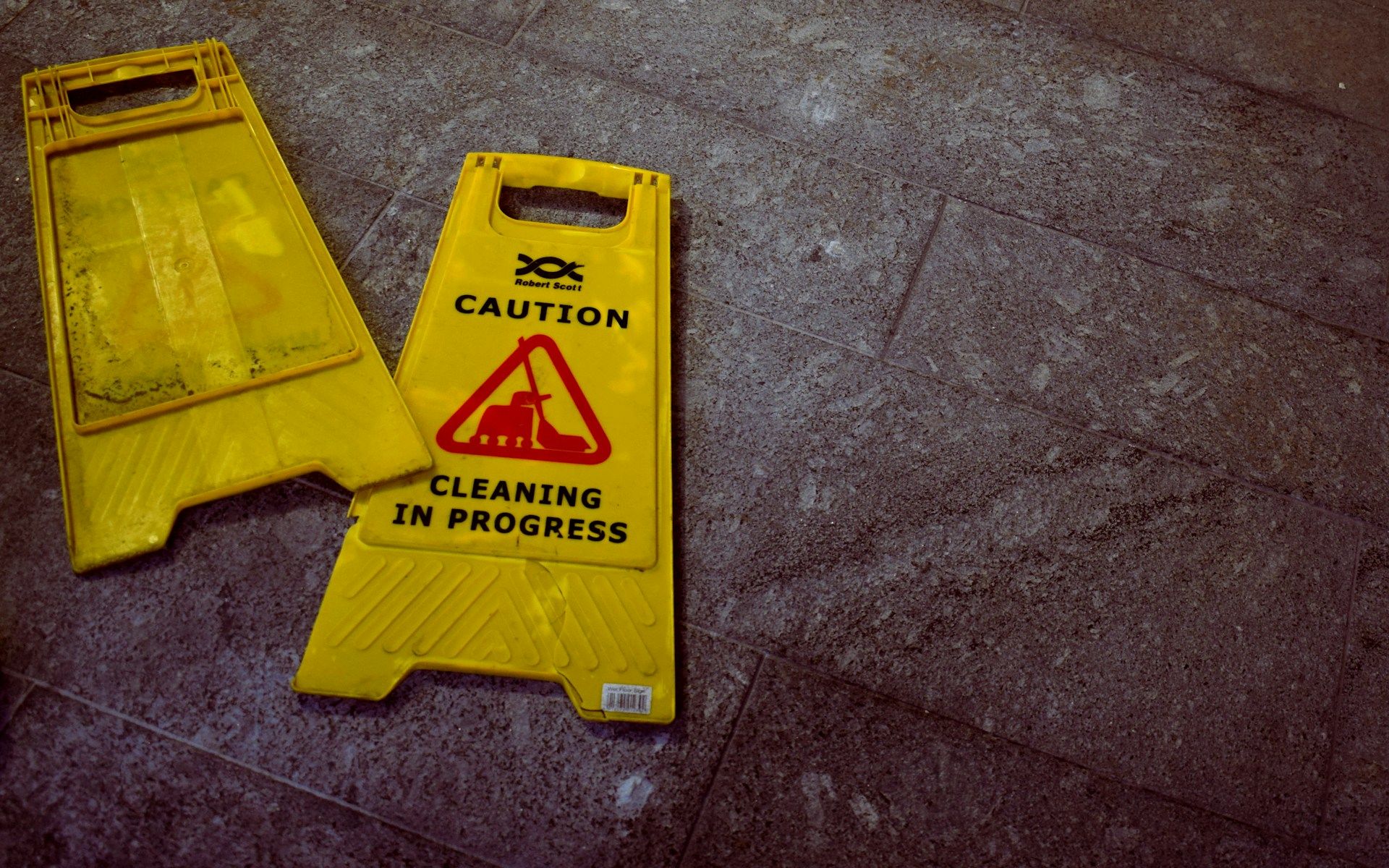 broken wet floor sign